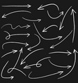 set hand drawn arrows doodle on black vector image