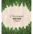 christmas tree branches on wooden background vector image vector image