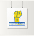 stand with ukraine raised up clenched fist vector image