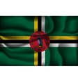 crumpled flag of dominica on a light background vector image vector image