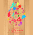 easter egg made from flowers on wooden background vector image