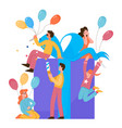 happy young people sit on huge big wrapped present vector image