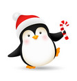 cheerful baby penguin dancing with candy cane vector image