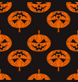 seamless halloween pattern with pumpkins vector image