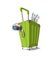 a suitcase with camera vector image