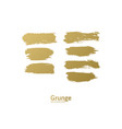 set of golden paint brush strokes - gold brush vector image