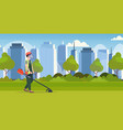 man gardener in uniform cutting grass with brush vector image