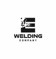 letter e welding logo welder silhouette working vector image