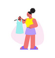 woman at clothes shop vector image vector image