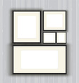 blank picture frames on a wooden wall background vector image