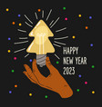 a man in his hand holds light bulb that glows vector image vector image