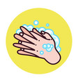 someone washing their hands with liquid soap vector image