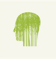 human head in profile with green young trees vector image