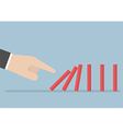 businessman hand pushing the domino effect vector image
