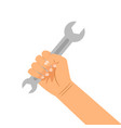 hand with wrench isolated on white vector image